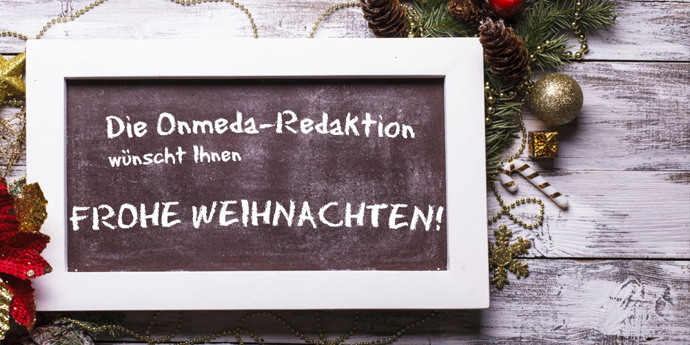 Onmeda-Weihnachtsgrüße auf einer Tafel